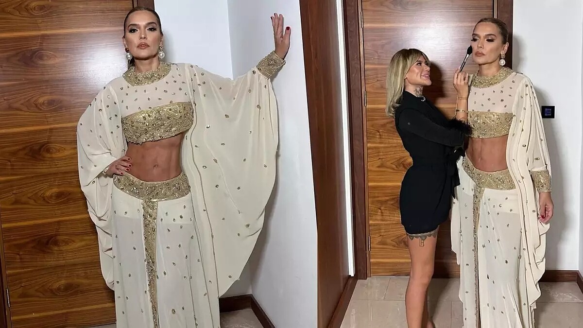 Demet Akalın, Muğla konserinde transparan kıyafetiyle karın kaslarını sergiledi